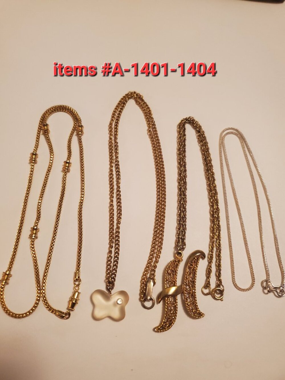 4 Necklaces, items # A-1401-1404, wt . 46 grams.